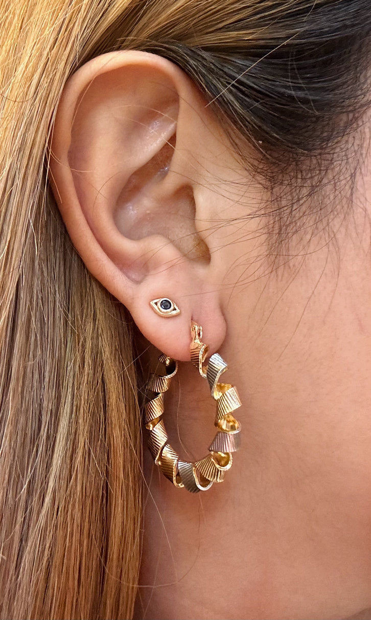 Aretes de acero hecho en Colombia